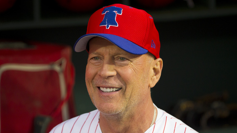 Bruce Willis smiling at a Phillies game