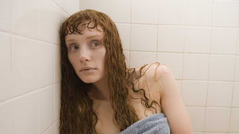 Bryce Dallas Howard huddled in shower