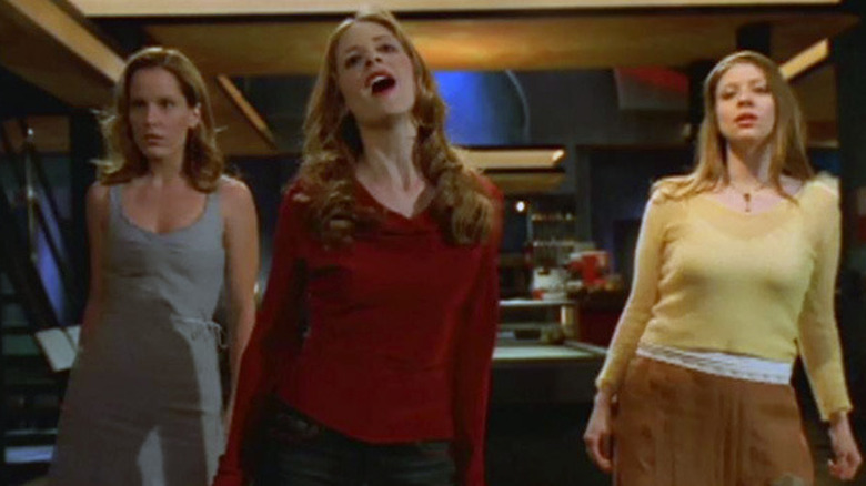 Buffy sings while Anya and Tara harmonize