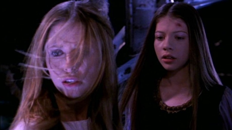 Buffy prepares to sacrifice herself as Dawn watches on