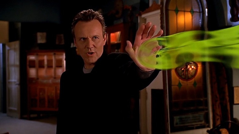 Giles uses magic