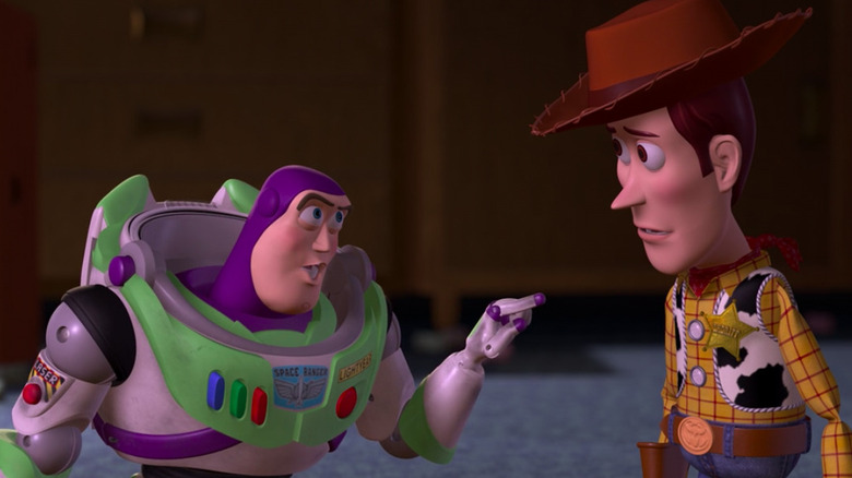 Buzz Lightyear points at Woody