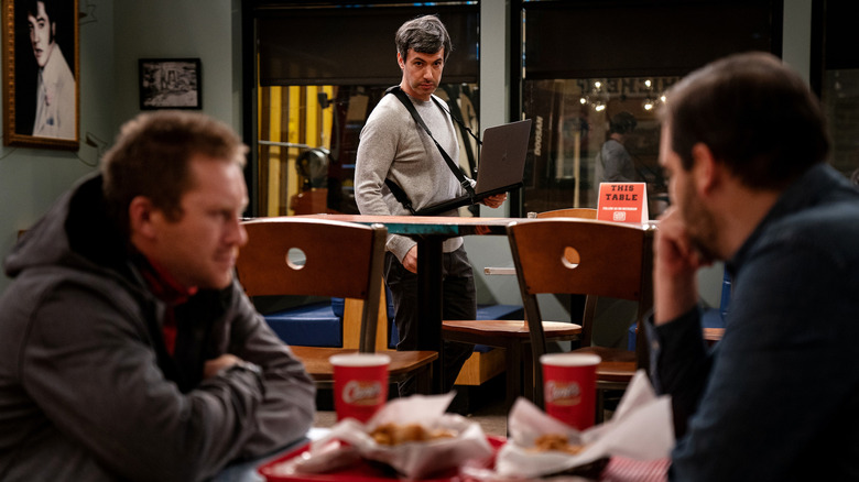 Nathan Fielder with laptop staring at Rehearsal