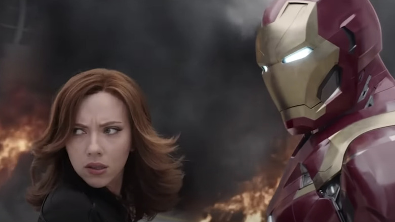 Black Widow and Iron Man in exploding airport