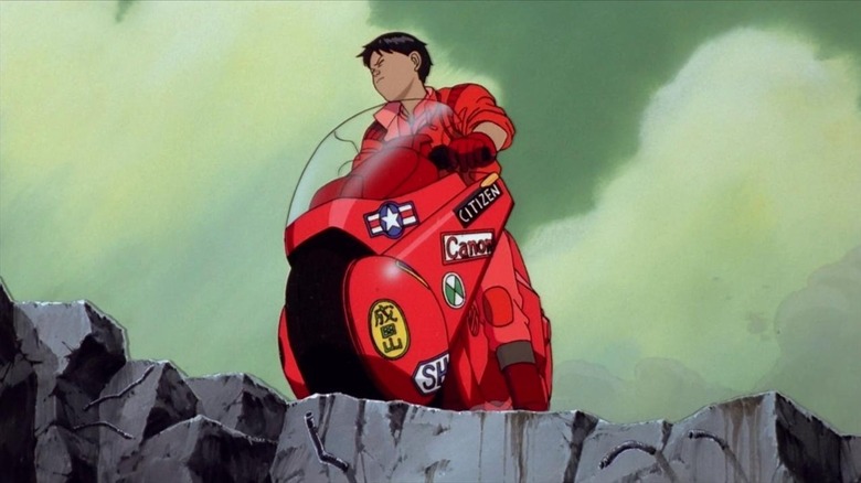 Kaneda riding motorcycle