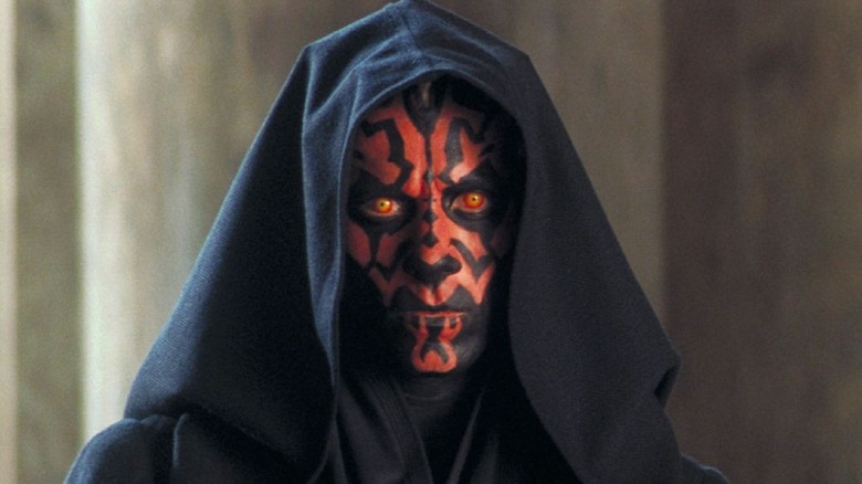 Darth Maul stares in hood