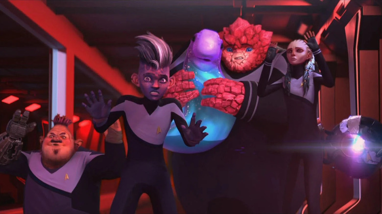 Protostar crew hold up their hands