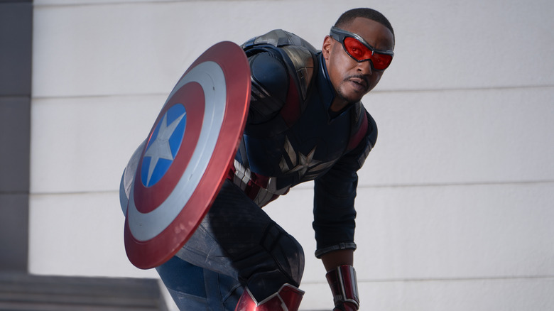 Captain America holding his shield up and running (2025)