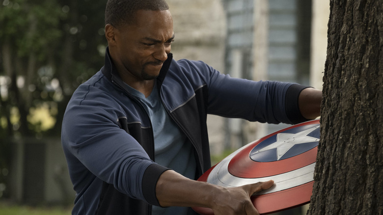 Sam Wilson grabbing Captain America shielf