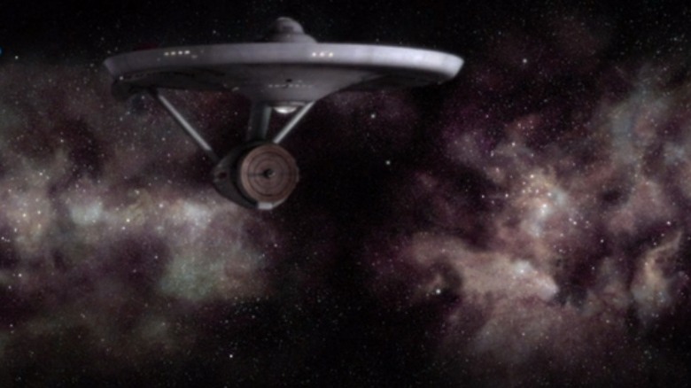 The USS Enterprise right outside the galactic barrier