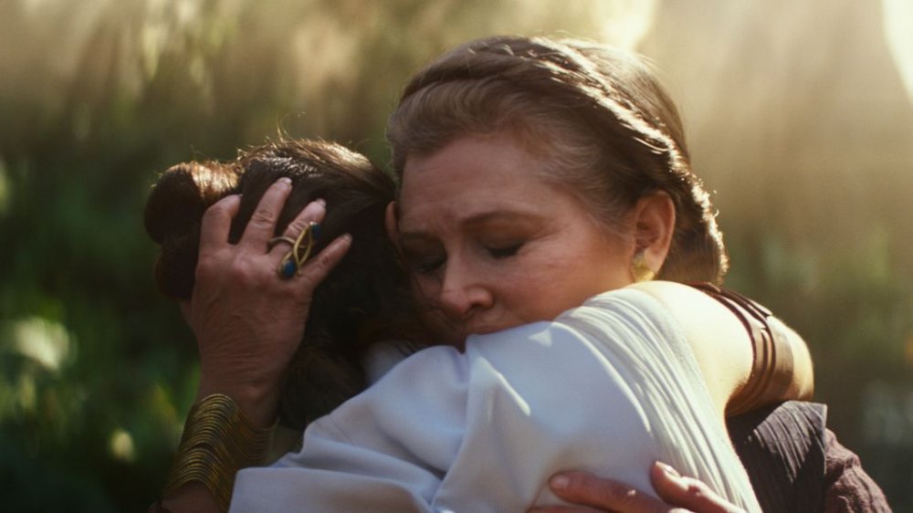 Daisy Ridley as Rey, Carrie Fisher as Leia Organa in The Rise of Skywalker