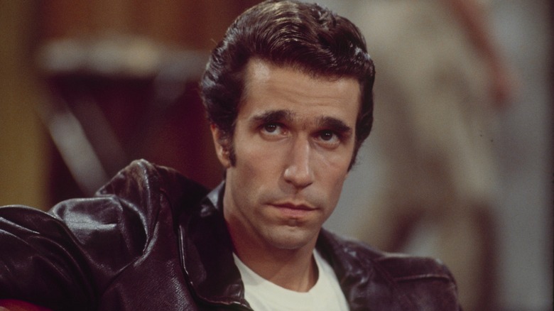 The Fonz looks left