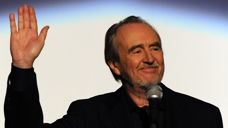 Wes Craven waving and smiling