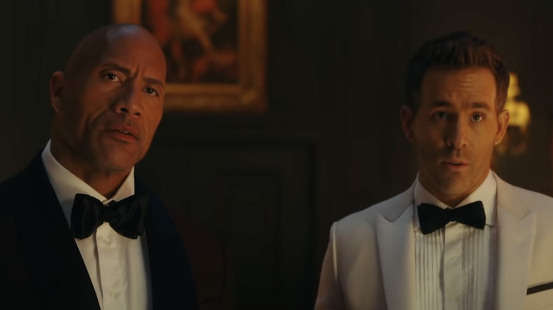 Dwayne Johnson and Ryan Reynolds in tuxedos