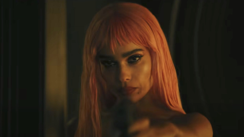 Selina Kyle pink wig pointing gun