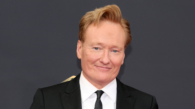 Conan O'Brien black suit and tie