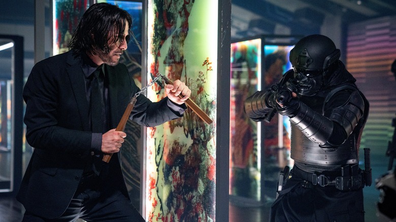 John Wick fighting armored soldier