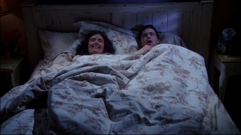 Friends Chandler and Monica in bed