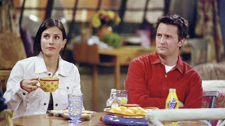 Chandler eats lunch with Monica