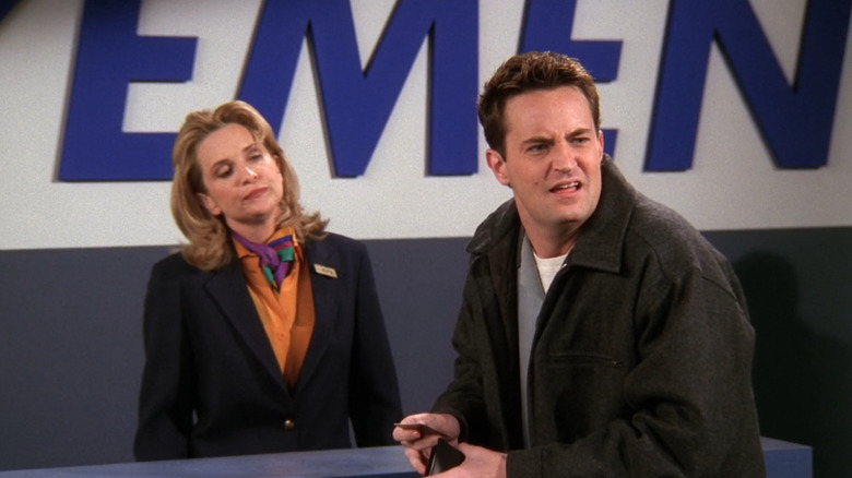 Chandler at airport with attendant