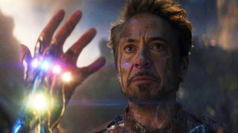 Tony wearing Thanos' glove