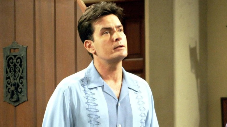 Charlie Harper standing in a doorway in Two and a Half Men