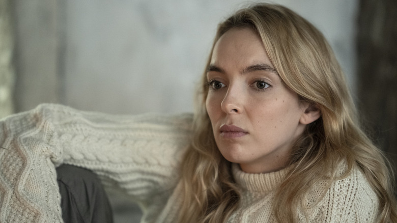 Villanelle looking solemnly in a sweater in Killing Eve