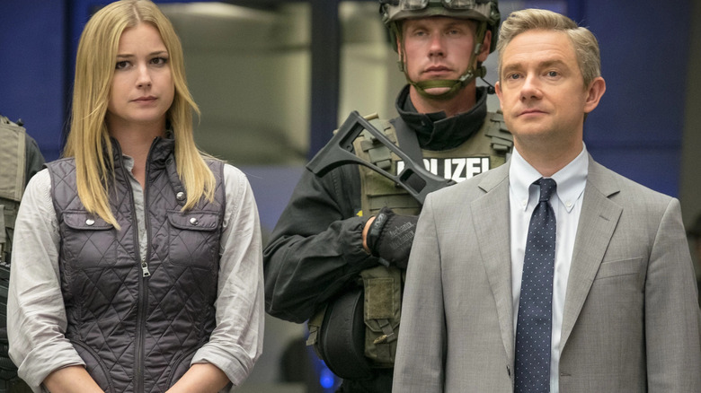 Everett Ross standing with Sharon Carter