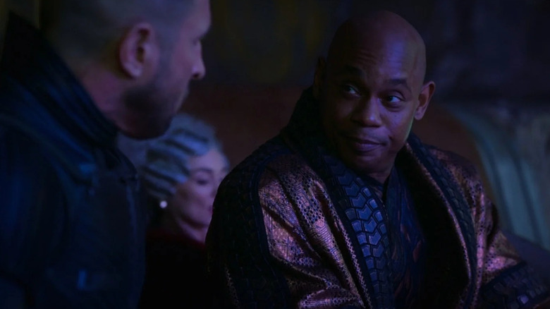 Bokeem Woodbine looking at Pablo Schreiber