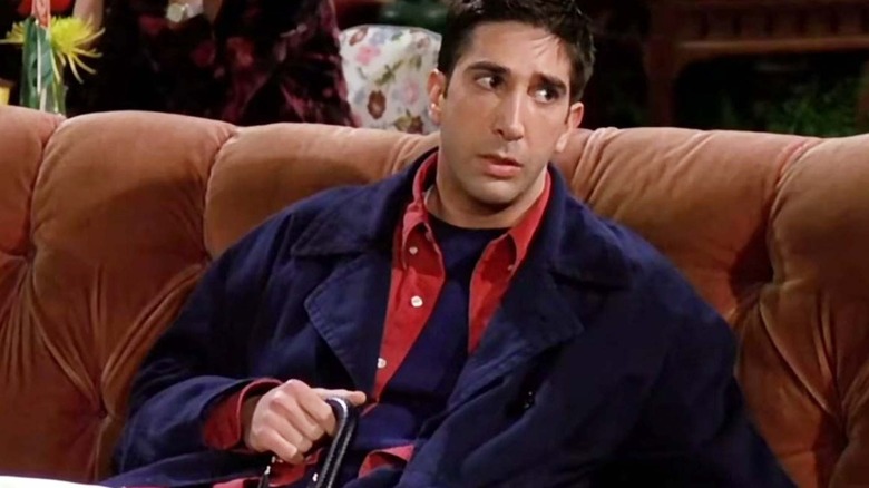 Ross sitting on couch