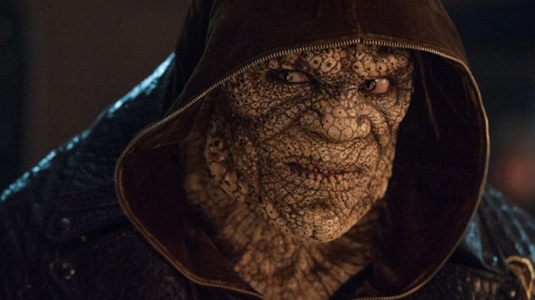 Killer Croc scowling