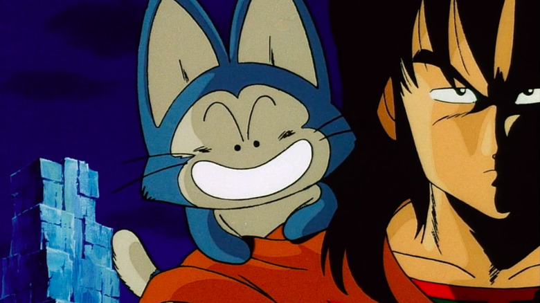 Puar talks while Yamcha stands in half-shadow