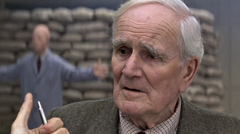 Desmond Llewelyn as Q