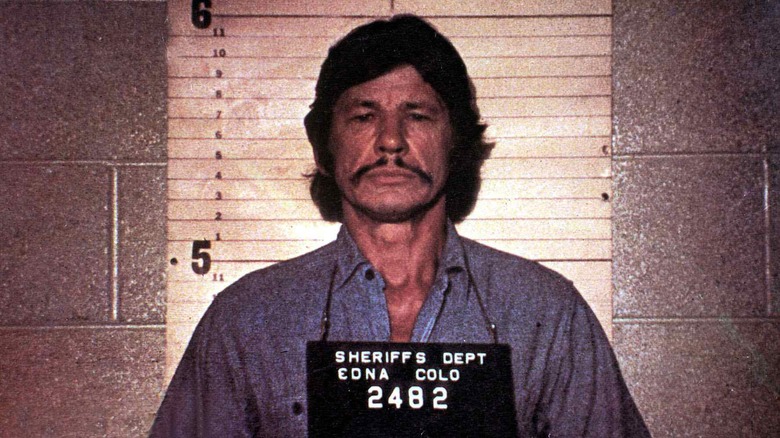 Charles Bronson poses for mugshot