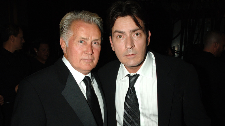 Martin and Charlie Sheen pose for a photo together