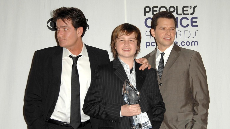 Cast of Two and a Half Men pose for photos