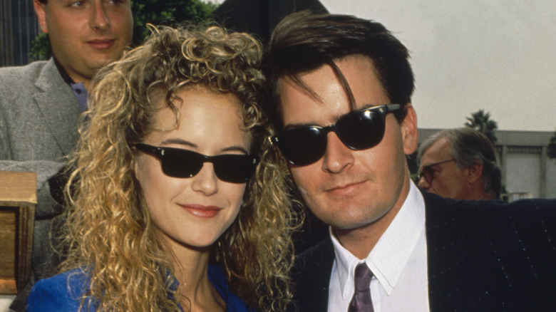 Kelly Preston and Charlie Sheen pose for a photo