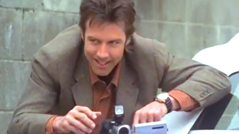 Eric Lohman uses a video camera