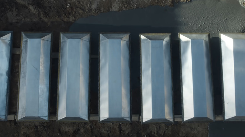 Zinc coffins in the ground