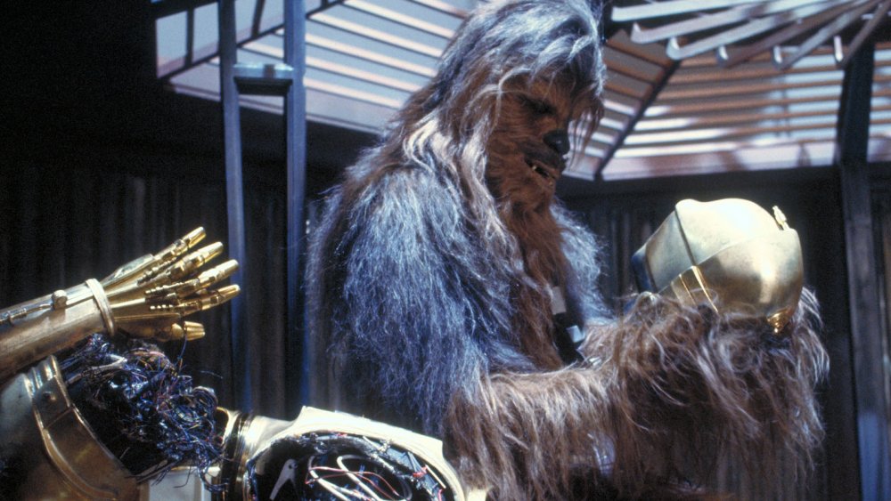 chewbacca repairs c3po