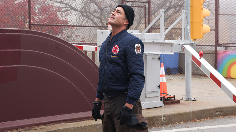 Kelly Severide from Chicago Fire looking up