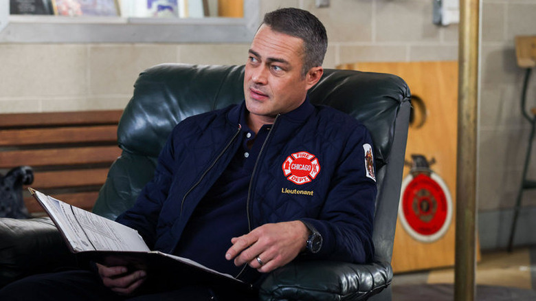 Kelly Severide in a chair 