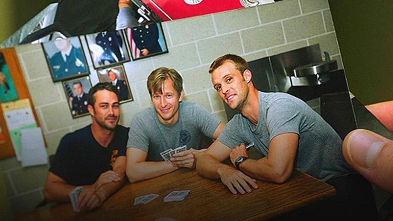 Kelly Severide, Andy Darden and Matt Casey playing cards