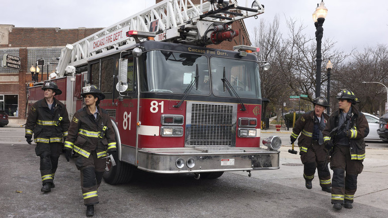 Chicago firefighters around truck