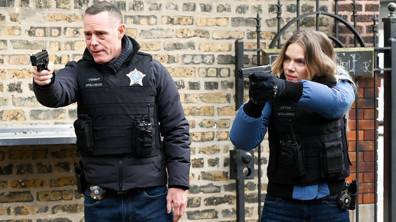 Hank and Hailey pointing guns