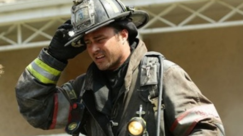 Taylor Kinney in fire gear in Chicago Fire