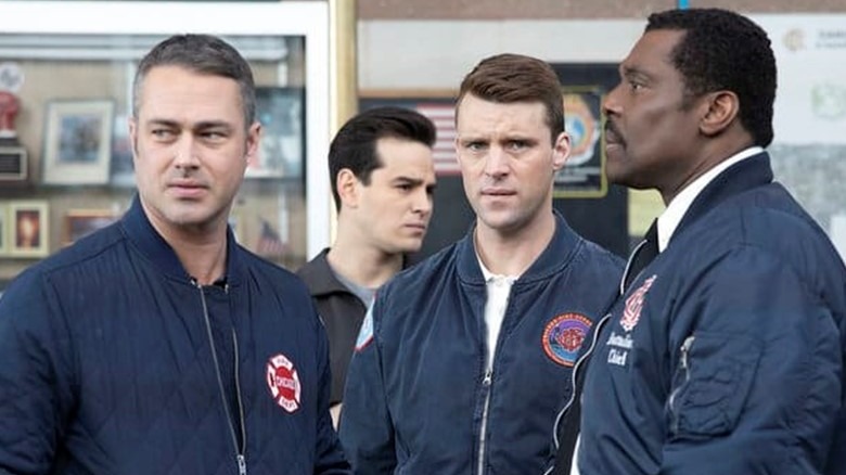 Taylor Kinney, Alberto Rosende, Jesse Spencer, Eammon Walker standing in Chicago Fire