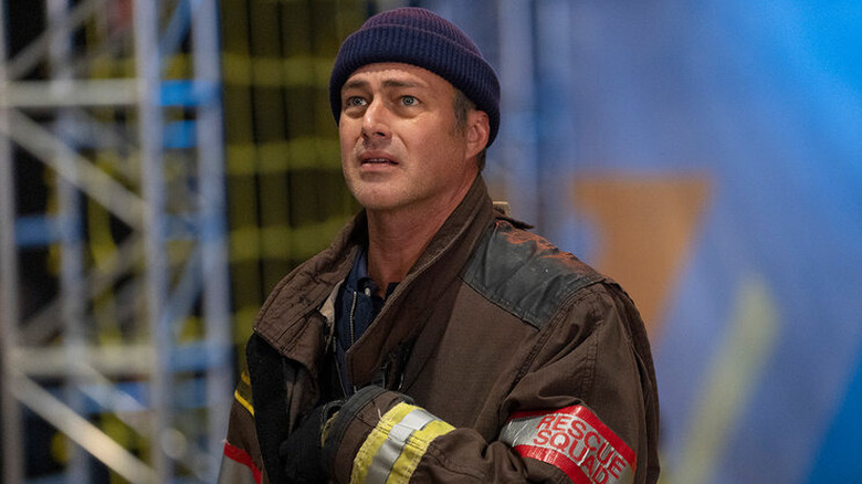 Kelly Severide on the case looking concerned in "Chicago Fire"