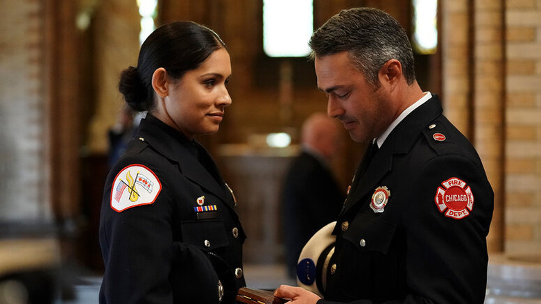 Kelly and Stella talking in dress uniforms in "Chicago Fire"