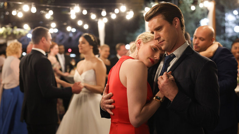 Jesse Spencer as Matt Casey and Kara Killmer as Sylvie Brett dancing in Chicago Fire